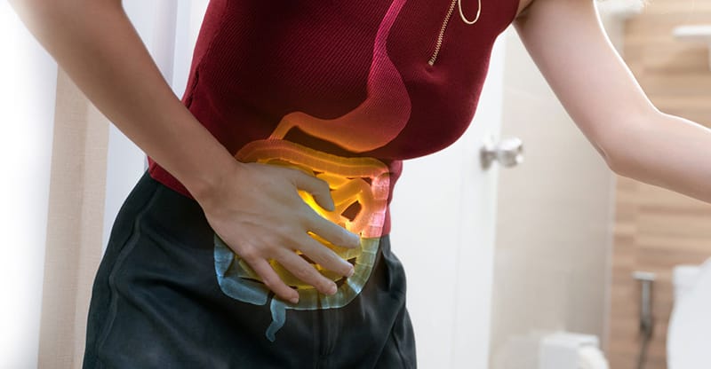 human digestive system on a woman experiencing abdominal pain